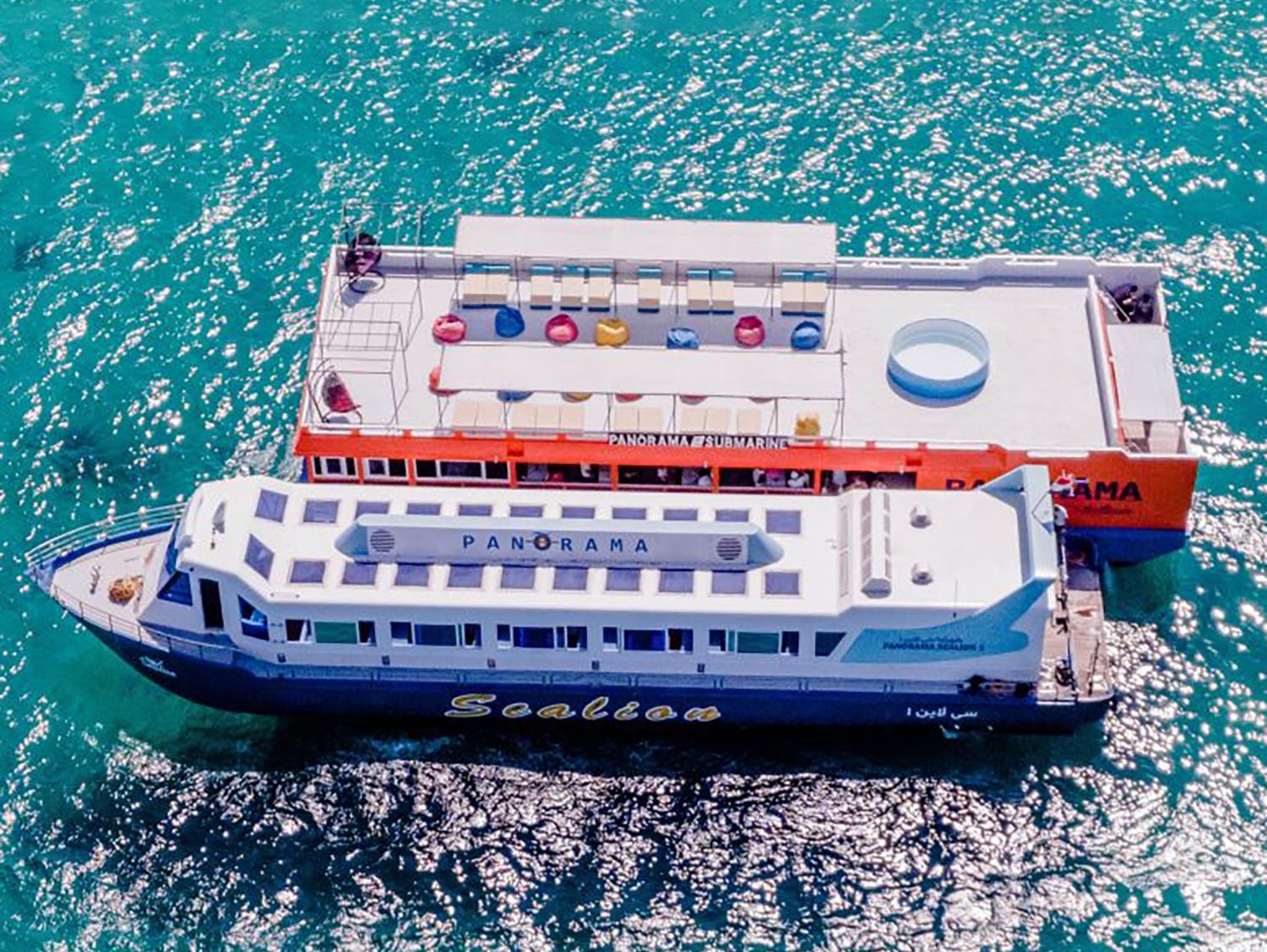 Guests relaxing at the floating station during the semi-submarine trip