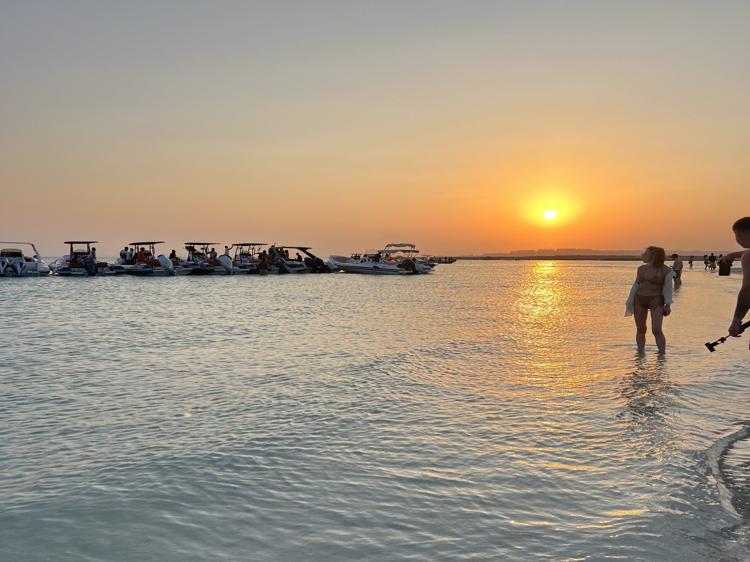 Group relaxing on the boat during the Sunset Island Trip from Hurghada