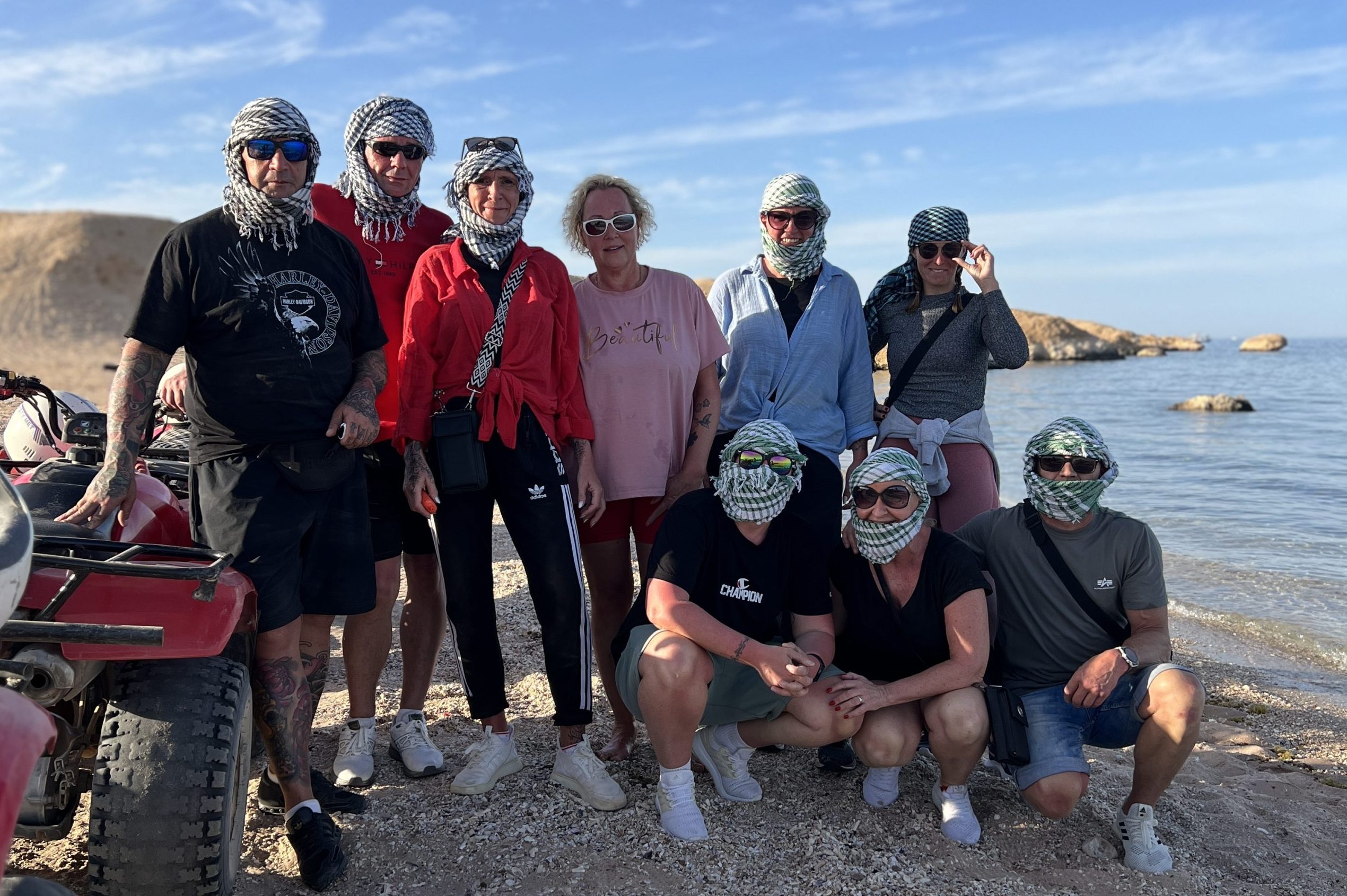 ATV quad riders exploring the coastal cliffs of Makadi Bay