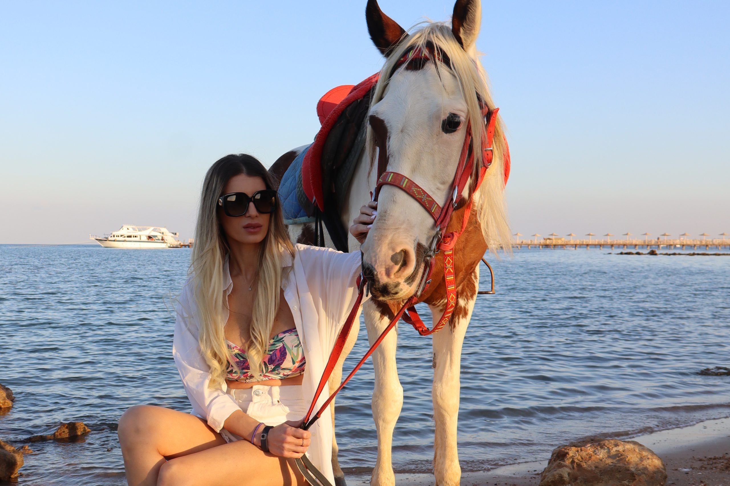 Horse riding along Hurghada beach at sunrise